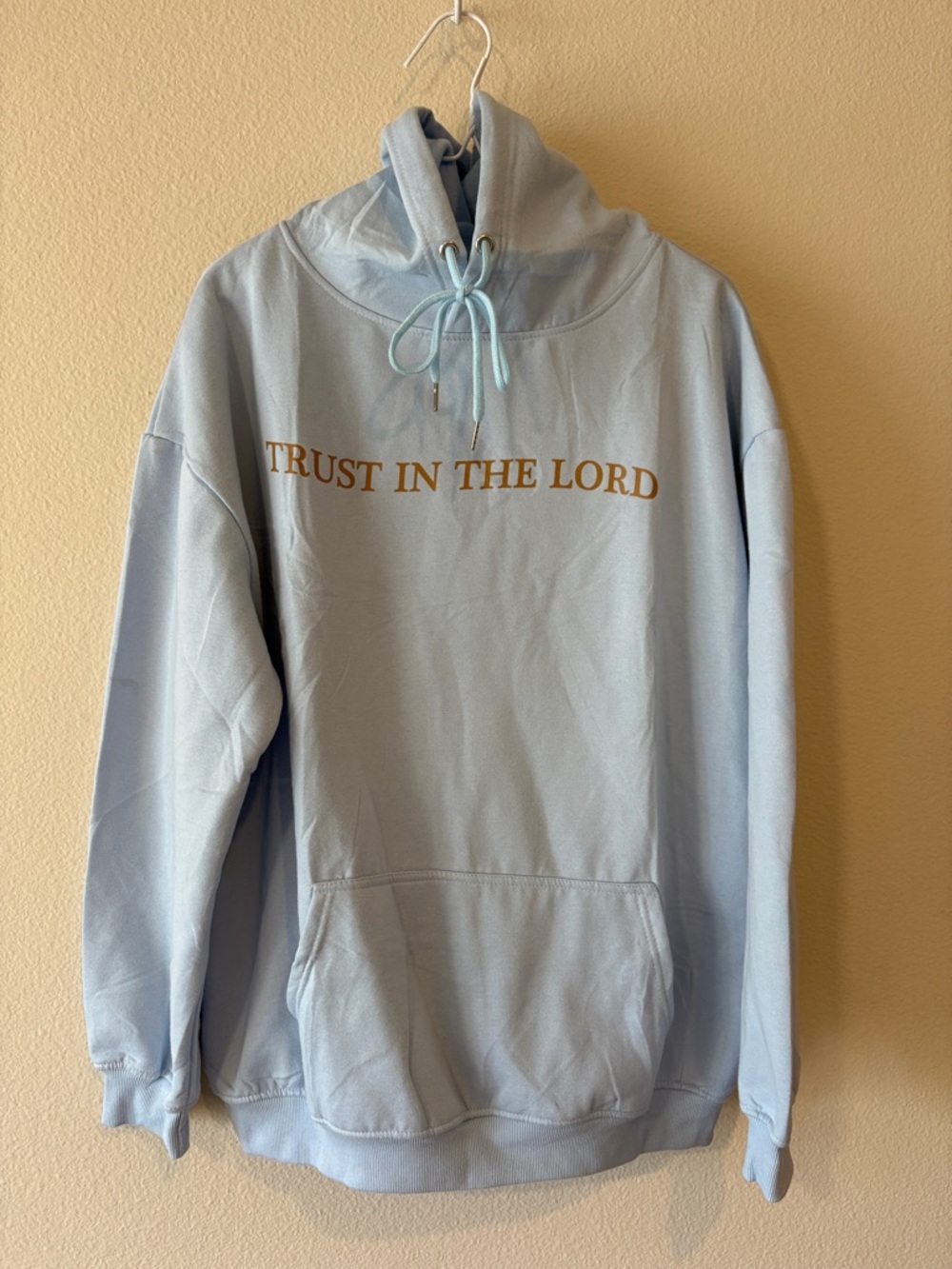 Light blue Faith related pullover sweatshirt with hood 'TRUST IN THE LORD'